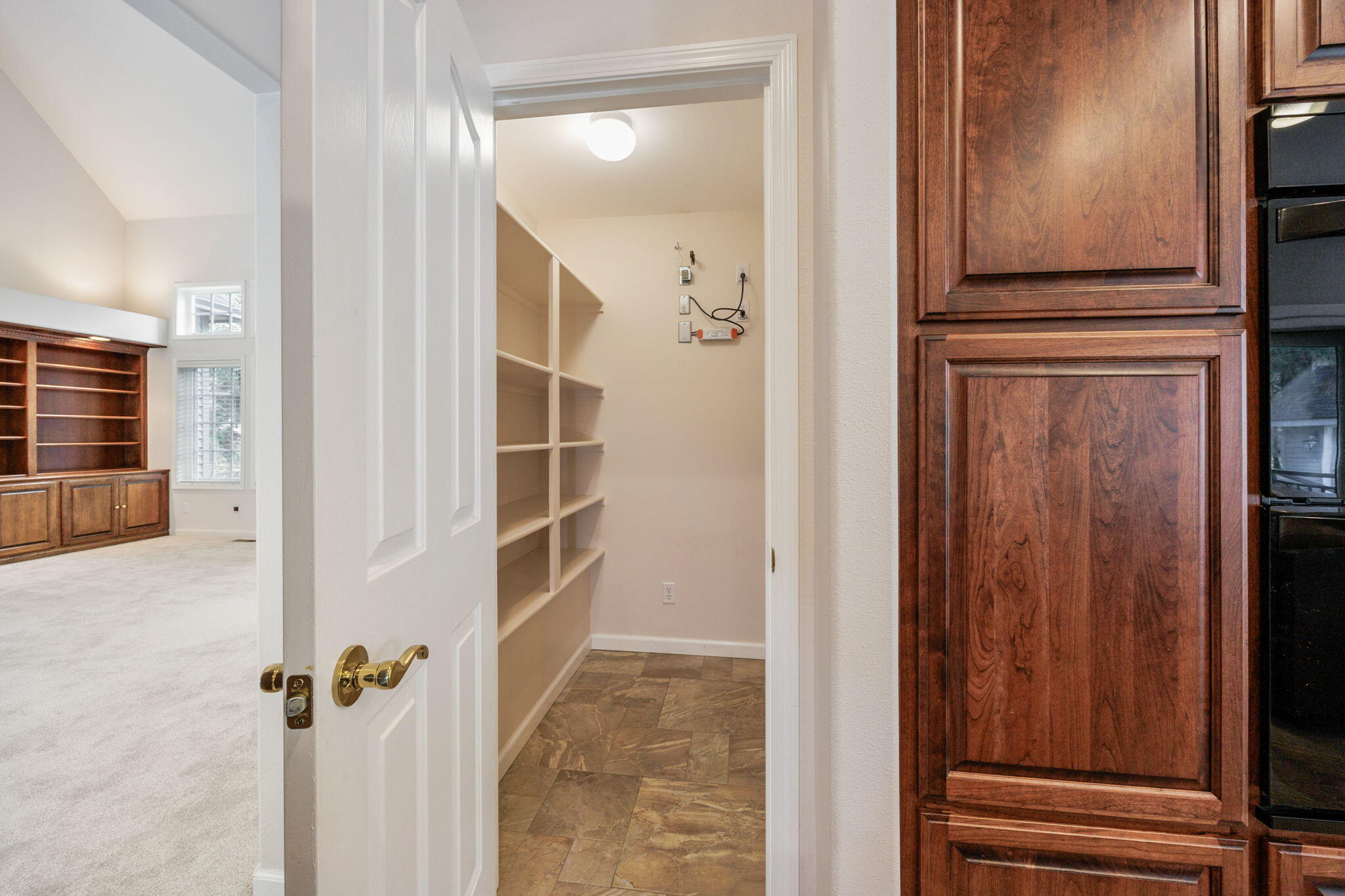 7081 Redthorne Road Rogue River, OR 97537 - Photo 21 of 58 a view of a hallway with wooden floor and staircase