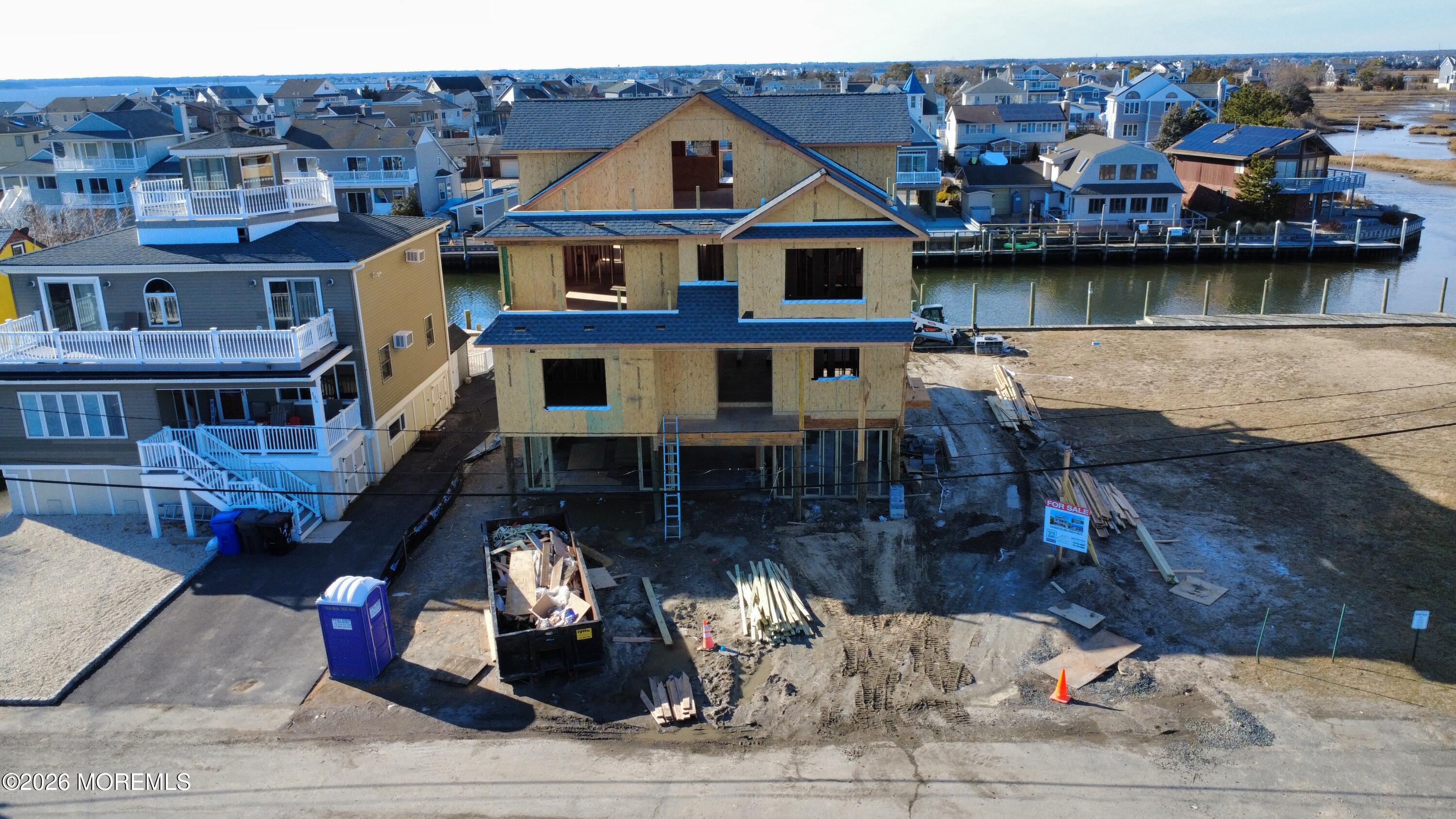 108 Rochester Drive Brick, NJ 08723 - Photo 12 of 46 a view of a house with roof deck and a patio