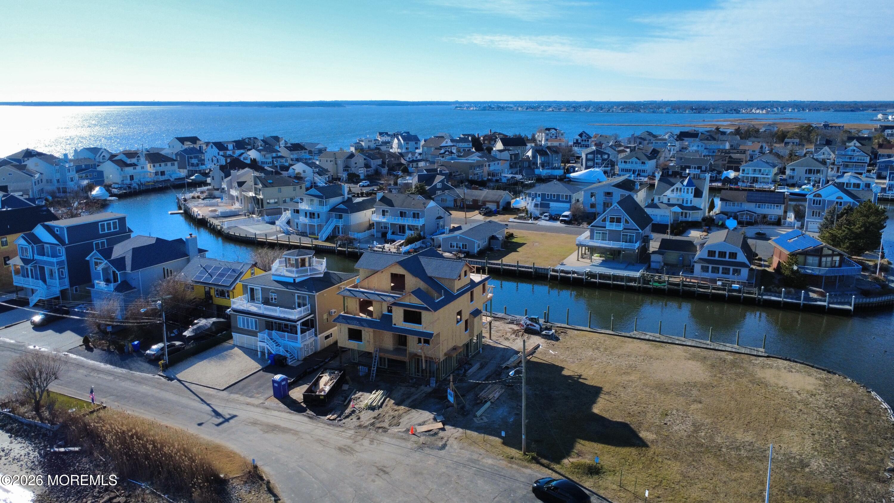 108 Rochester Drive Brick, NJ 08723 - Photo 40 of 46 an aerial view of a house with a lake view