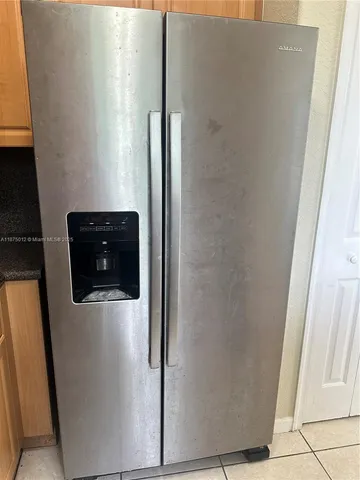 a close view of a refrigerator in kitchen
