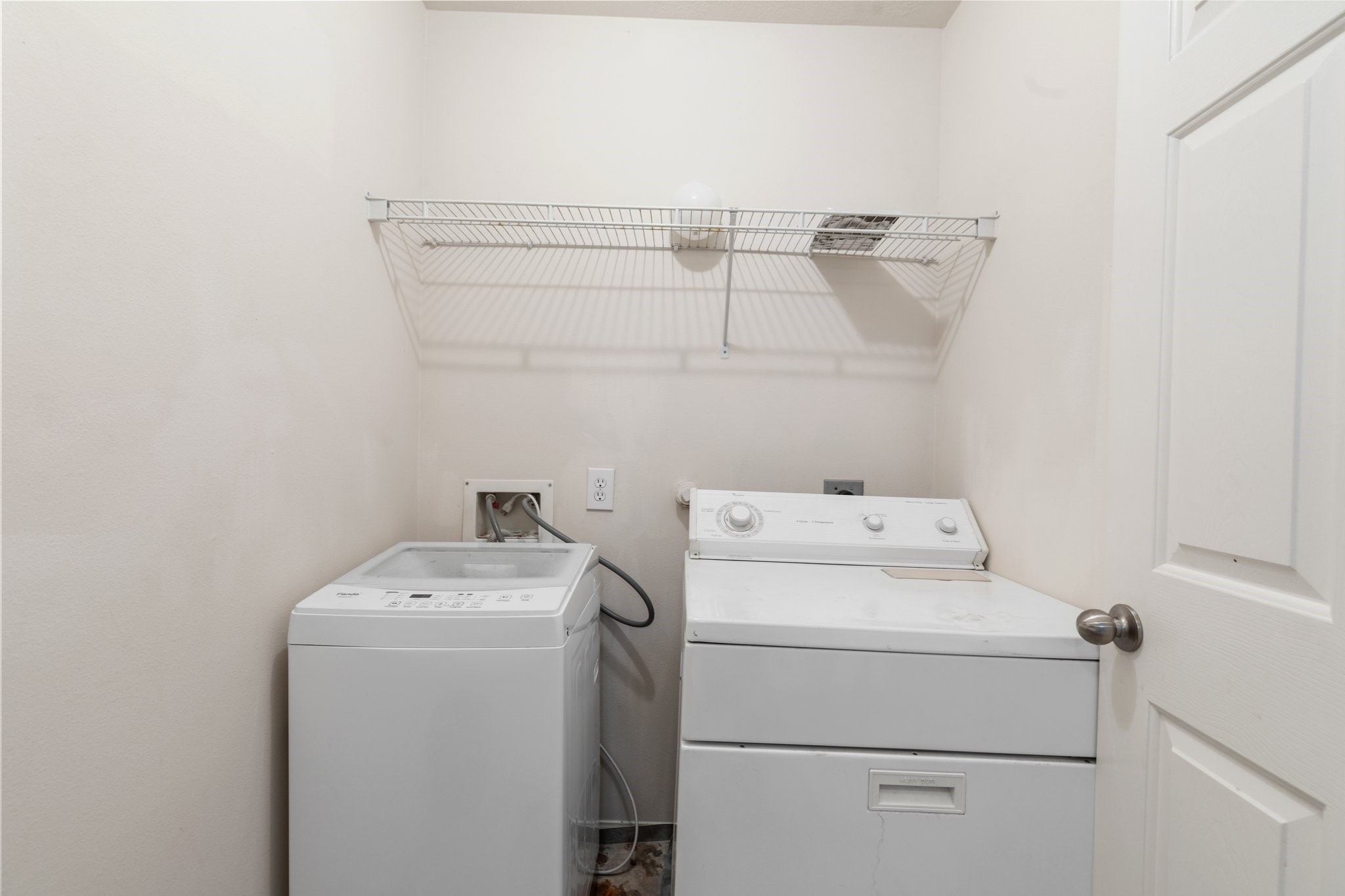 3111 Holly Ranch Drive Katy, TX 77494 - Photo 24 of 28 a utility room with dryer and washer