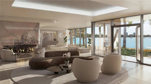 a living room with furniture and large windows