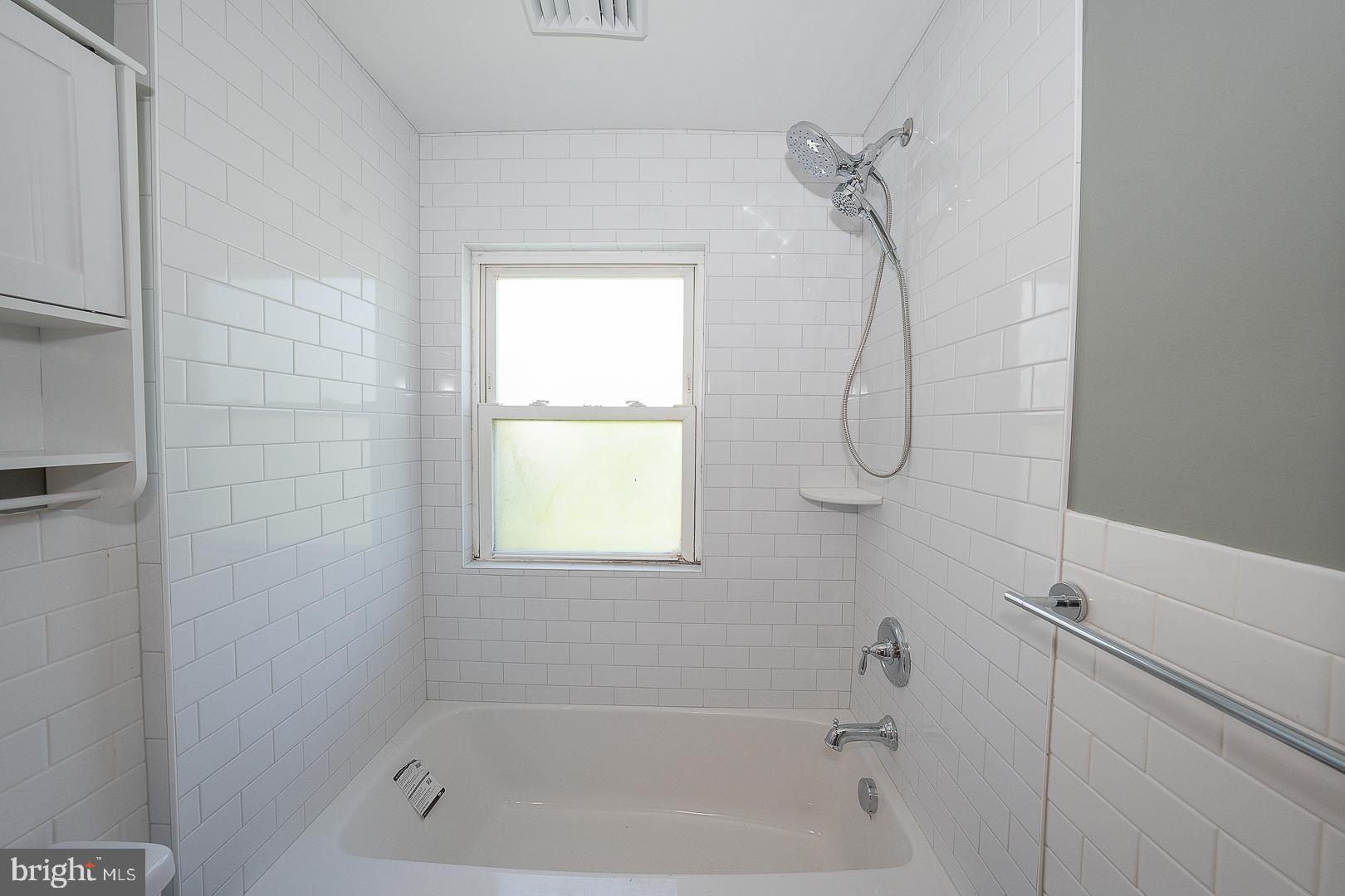 141 West Wayne Avenue Wayne, PA 19087 - Photo 11 of 22 a bathroom with a bath tub with a shower