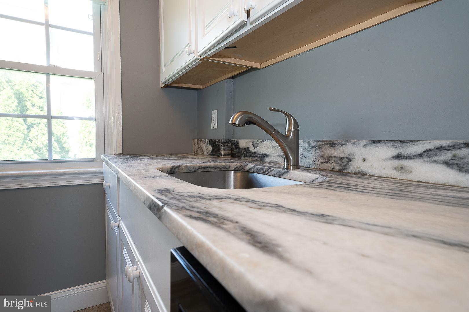 141 West Wayne Avenue Wayne, PA 19087 - Photo 14 of 22 a close view of sink and tap