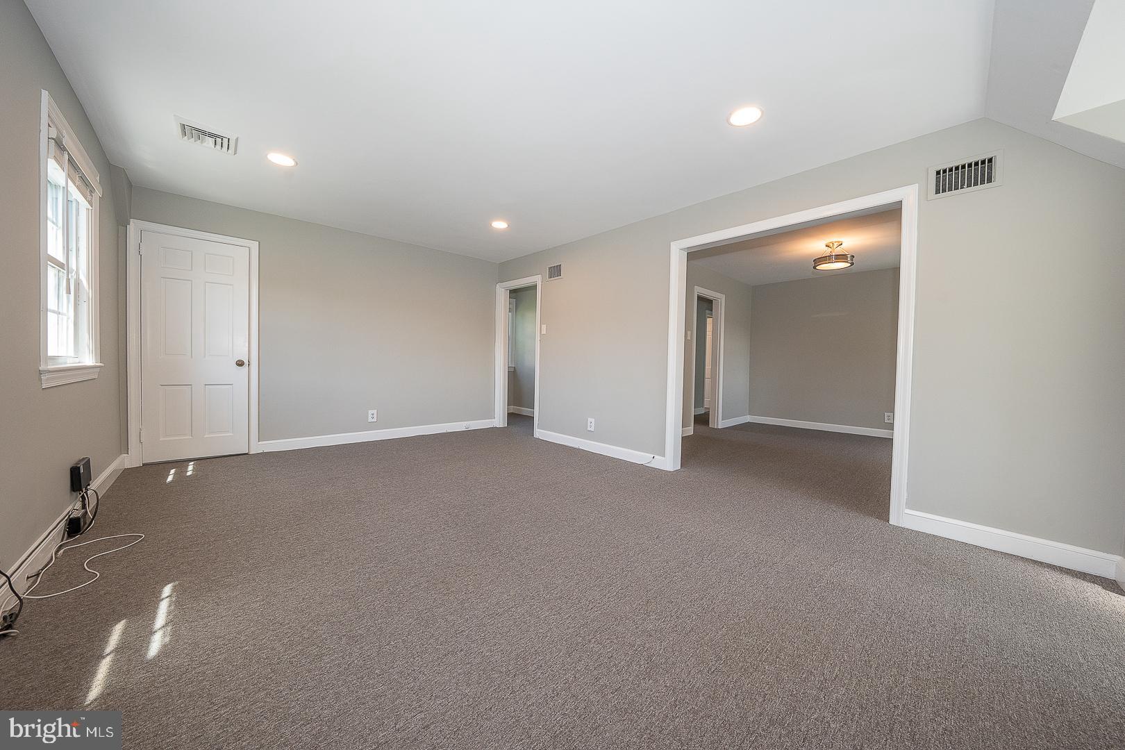 141 West Wayne Avenue Wayne, PA 19087 - Photo 5 of 22 an empty room with windows and closet