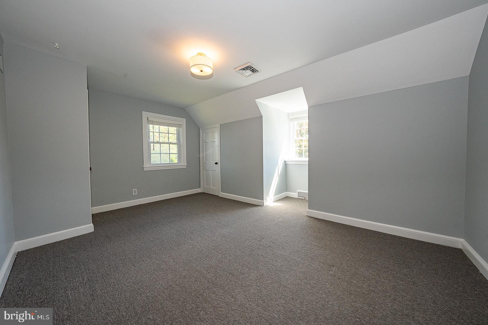 141 West Wayne Avenue Wayne, PA 19087 - Photo 7 of 22 a view of an empty room with a window