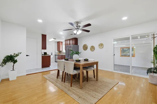 a view of a dining room with furniture