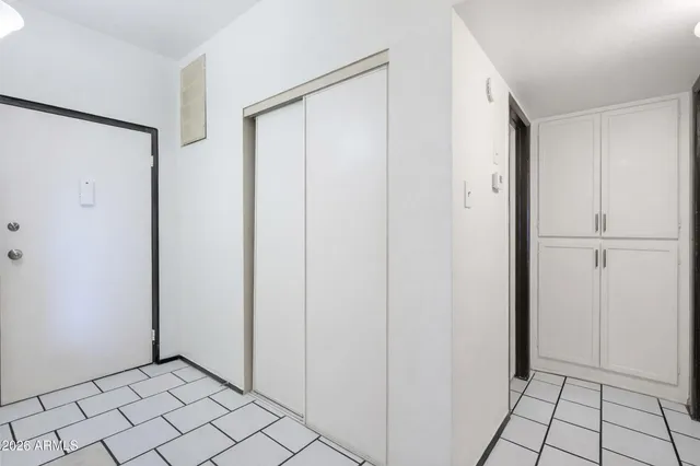 a view of a big room with wooden floor and fireplace