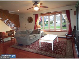 8 June Road Levittown, PA 19056 - Photo 3 of 12 a living room with furniture and a large window
