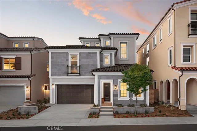 a front view of a house with yard