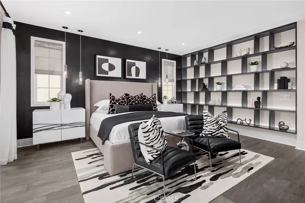 a bedroom with furniture and a book shelf