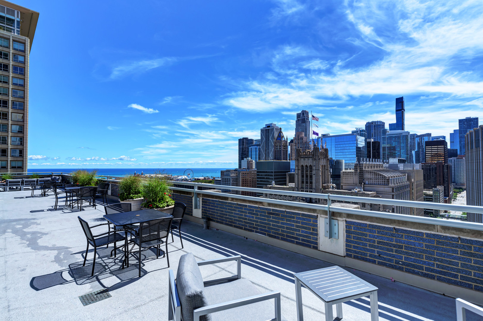 222 East Pearson Street, Unit 203 Chicago, IL 60611 - Photo 22 of 29 a view of a terrace with chairs