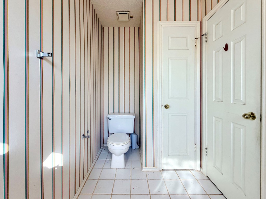 1106 Thistle Trail Cedar Park, TX 78613 - Photo 18 of 37 a bathroom with a toilet and a shower