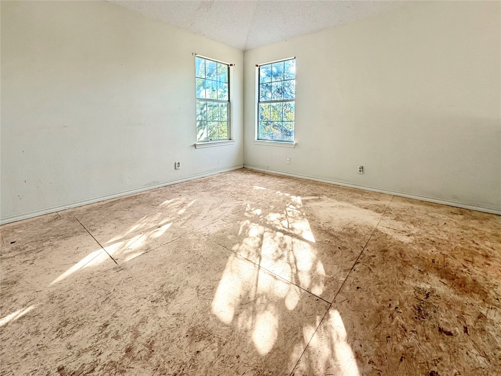 1106 Thistle Trail Cedar Park, TX 78613 - Photo 25 of 37 a view of an empty room with a window