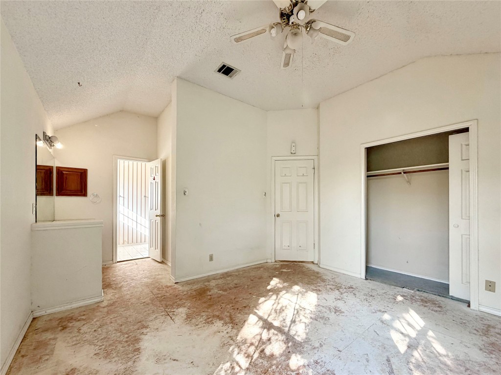 1106 Thistle Trail Cedar Park, TX 78613 - Photo 26 of 37 a view of a big room with closet and chandelier fan