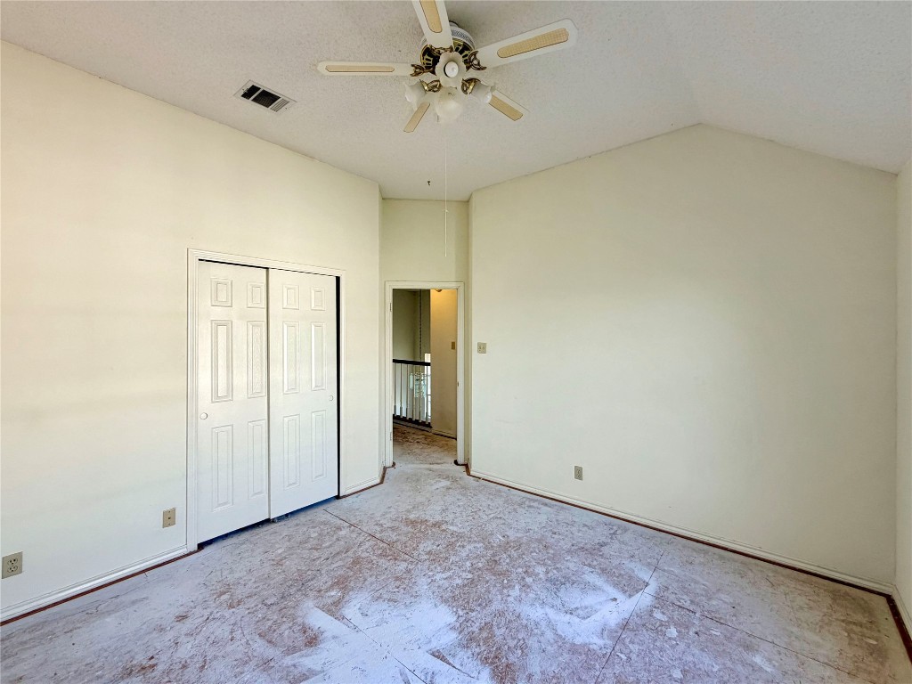 1106 Thistle Trail Cedar Park, TX 78613 - Photo 34 of 37 an empty room with closet and a ceiling fan