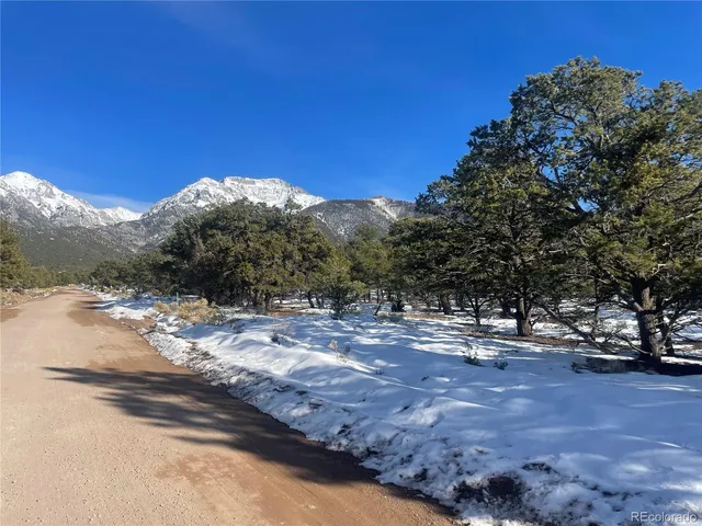 a view of the road and mountains