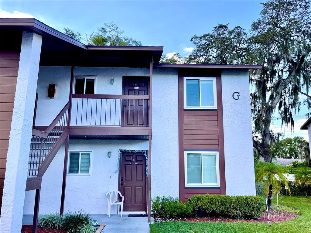 a front view of a house with a porch