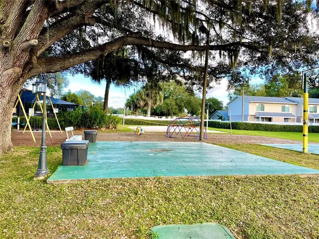 a view of a garden with swimming pool