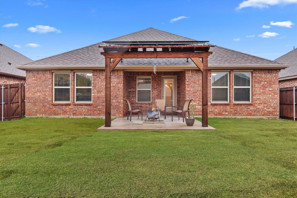 1653 Albatross Road Princeton, TX 75407 - Photo 2 of 18 a view of a house with a yard and sitting area
