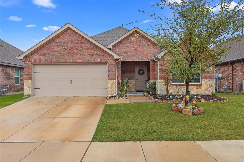 1653 Albatross Road Princeton, TX 75407 - Photo 3 of 18 a front view of house with a garden