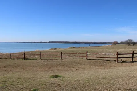 a view of a lake with outdoor space