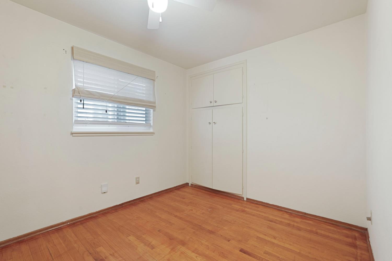 1007 Cardinal Street Lodi, CA 95240 - Photo 17 of 31 an empty room with a window