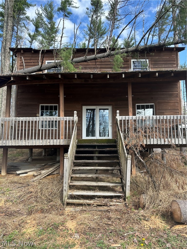 Front of the Cabin with a covered porch
