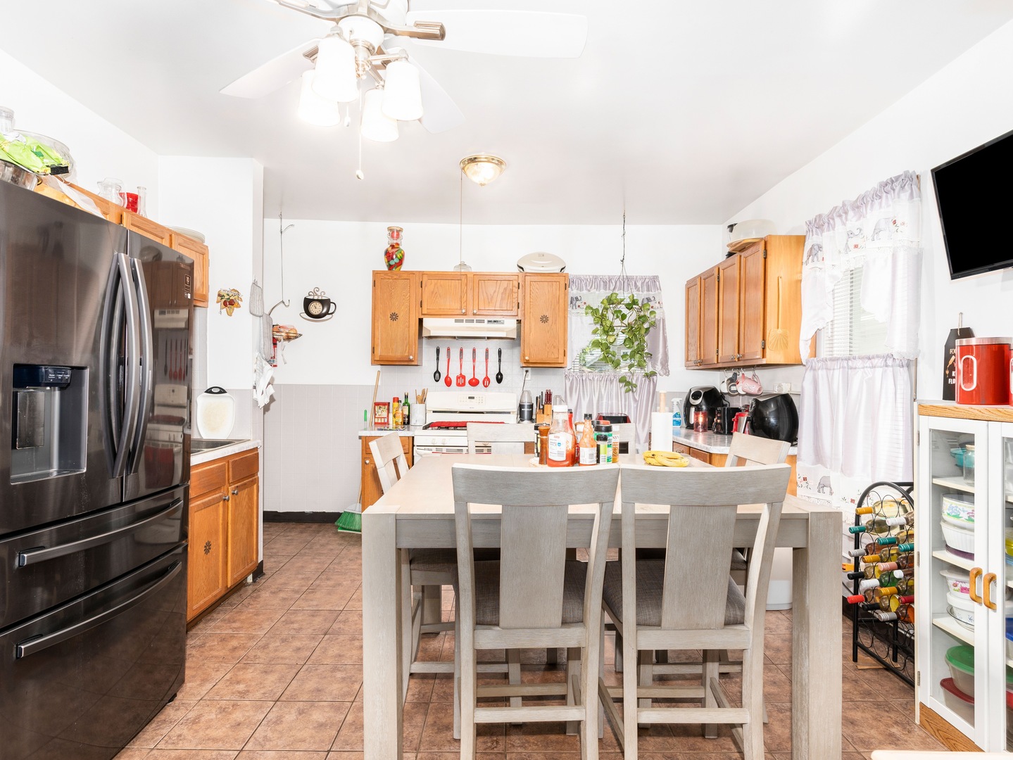 Undisclosed Address Chicago, IL 60651 - Photo 12 of 19 a kitchen with stainless steel appliances a refrigerator and a stove top oven