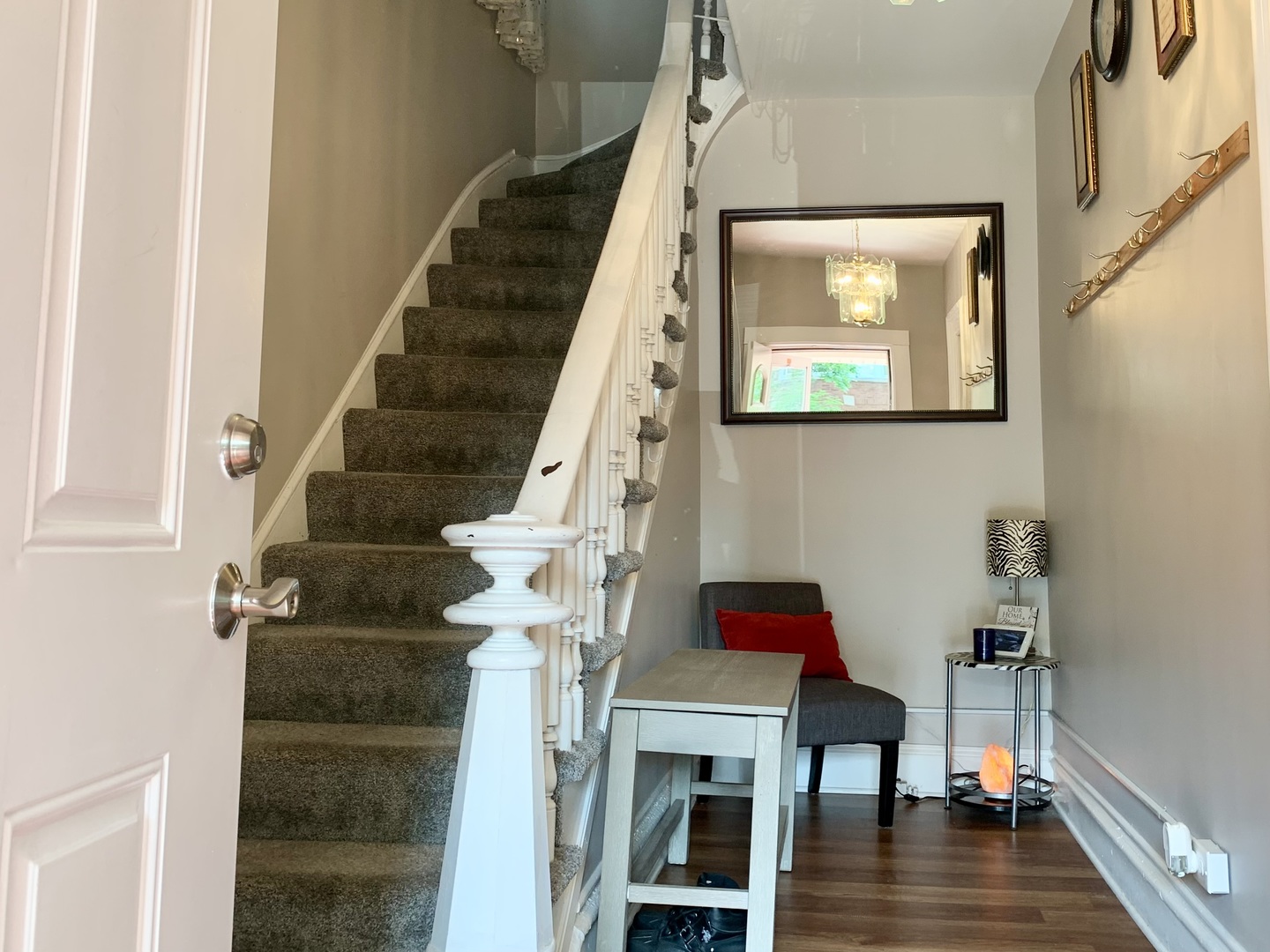 Undisclosed Address Chicago, IL 60651 - Photo 2 of 19 a view of entryway with wooden floor