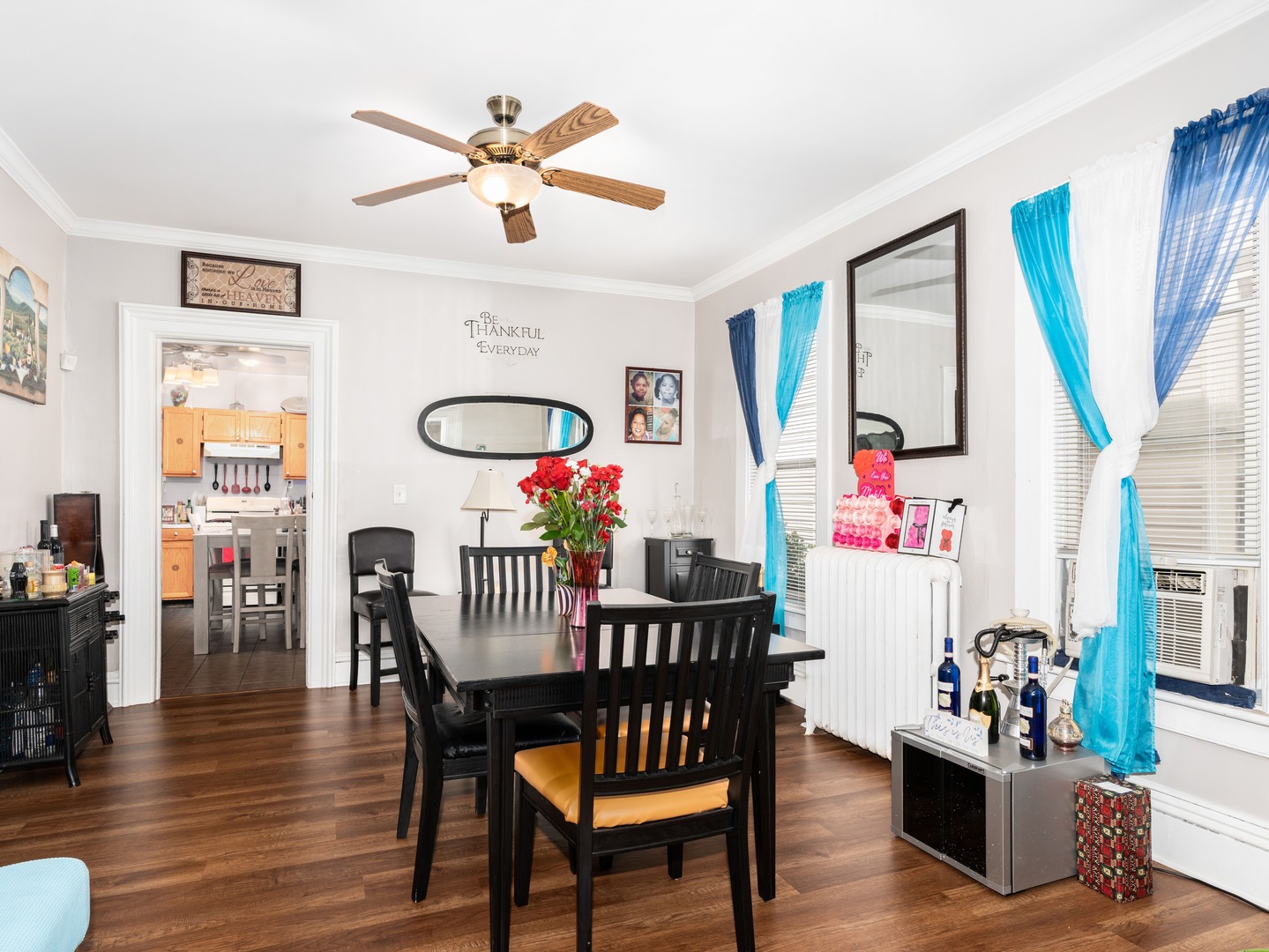 Undisclosed Address Chicago, IL 60651 - Photo 4 of 19 a view of a dining room with furniture and wooden floor