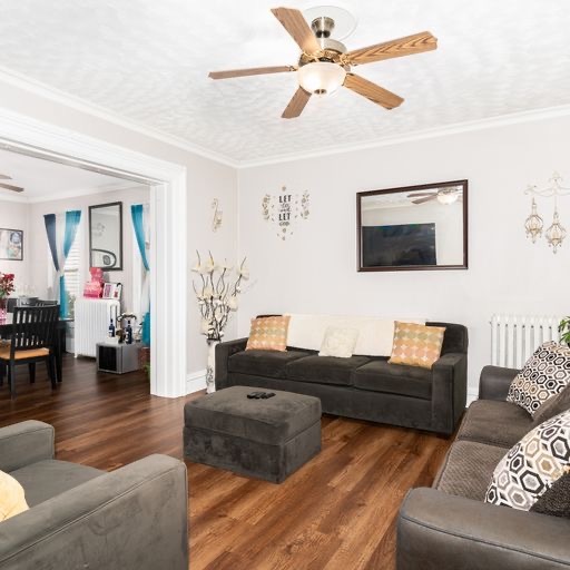 Undisclosed Address Chicago, IL 60651 - Photo 5 of 19 a living room with furniture and a ceiling fan