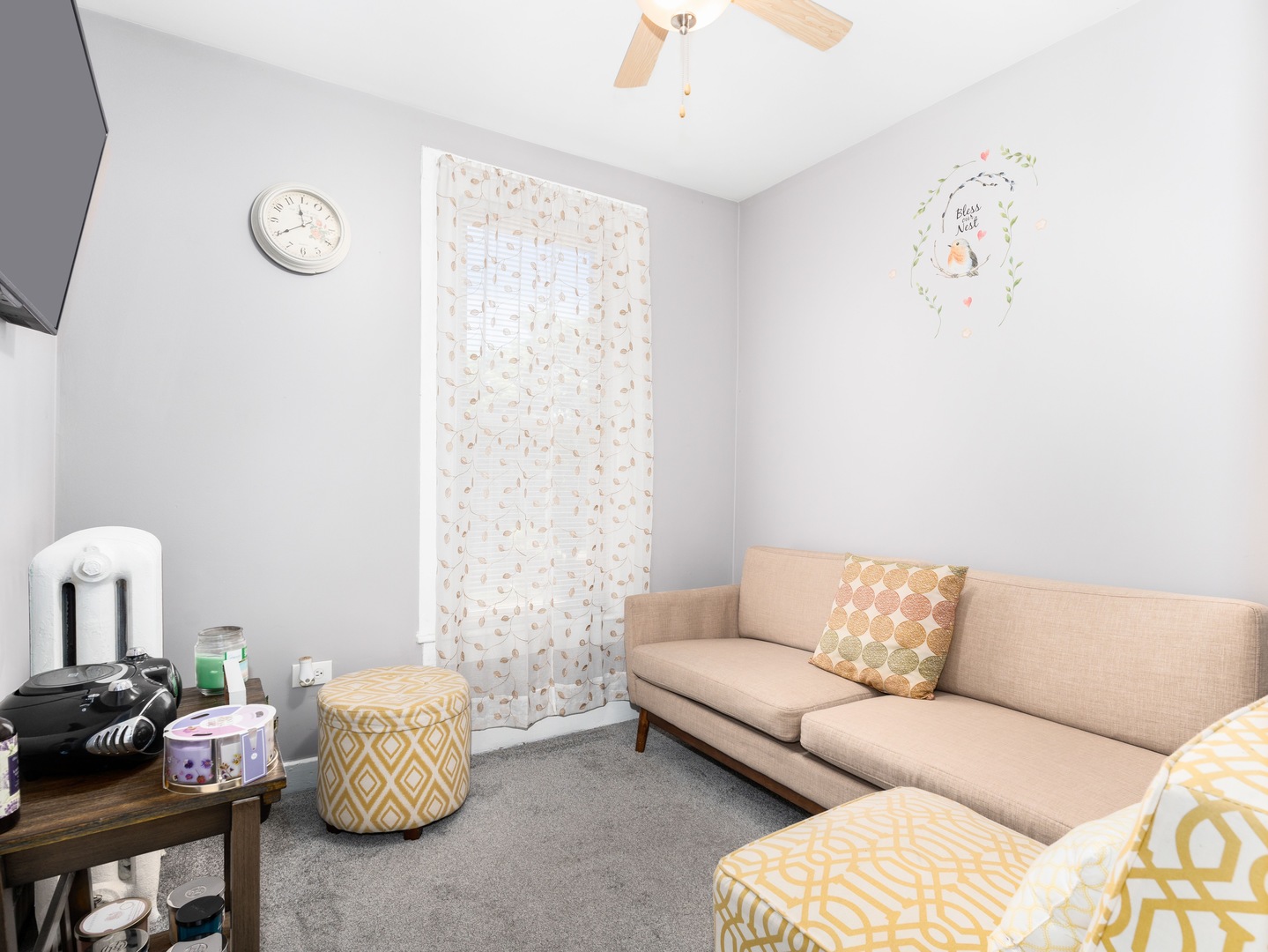 Undisclosed Address Chicago, IL 60651 - Photo 9 of 19 a living room with furniture and a window