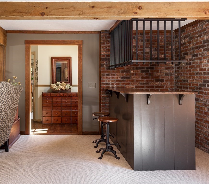 4 Chestnut Street Hopkinton, MA 01748 - Photo 14 of 40 a view of a livingroom with gym equipment