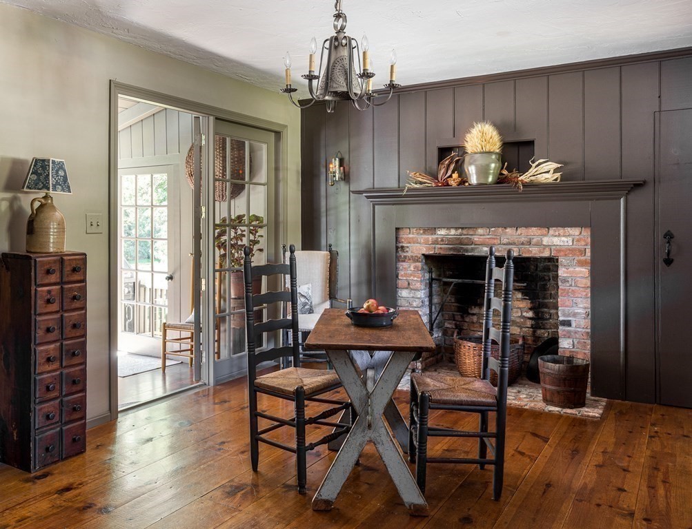 4 Chestnut Street Hopkinton, MA 01748 - Photo 16 of 40 a living room with furniture and a fireplace