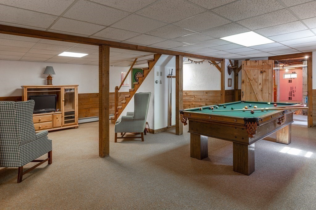 4 Chestnut Street Hopkinton, MA 01748 - Photo 27 of 40 a room with furniture and air hockey table