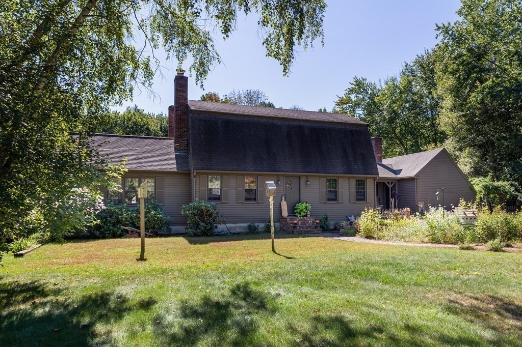 4 Chestnut Street Hopkinton, MA 01748 - Photo 36 of 40 a view of a house with backyard and trees