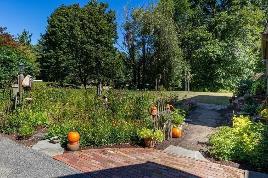 4 Chestnut Street Hopkinton, MA 01748 - Photo 37 of 40 a view of a park with seating area