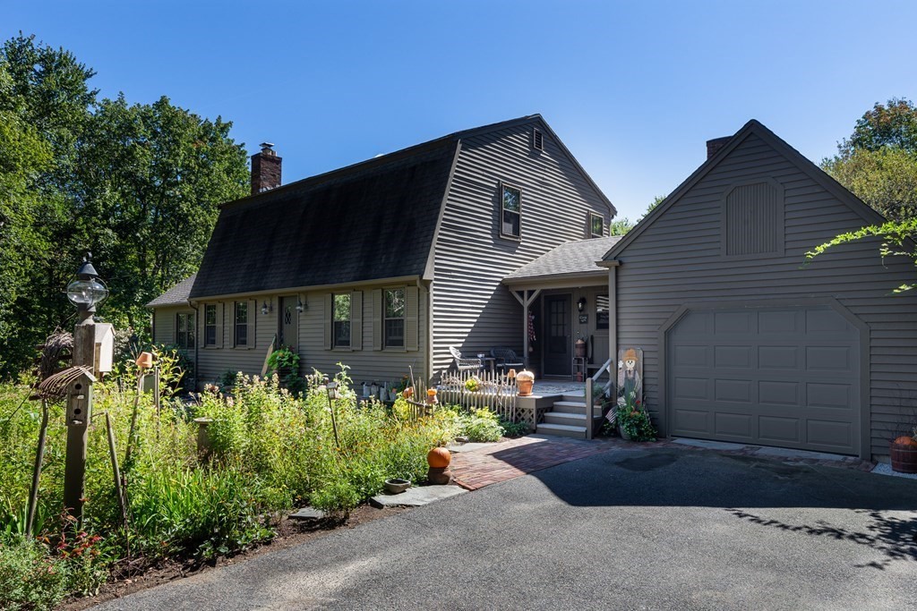 4 Chestnut Street Hopkinton, MA 01748 - Photo 40 of 40 a front view of a house with a yard