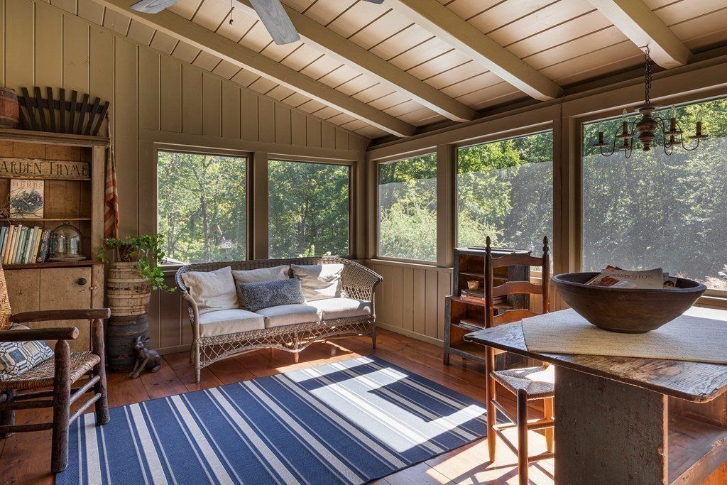 4 Chestnut Street Hopkinton, MA 01748 - Photo 4 of 40 a living room with furniture a rug potted plant and a large window