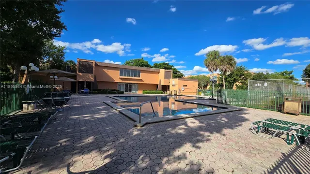 a view of a house with swimming pool