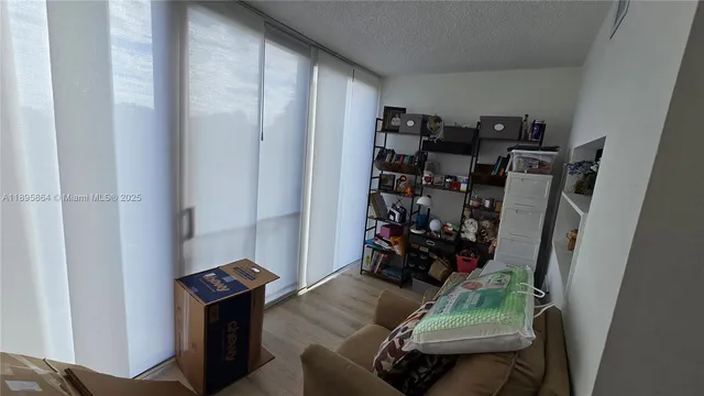 a view of a room with storage and utility room