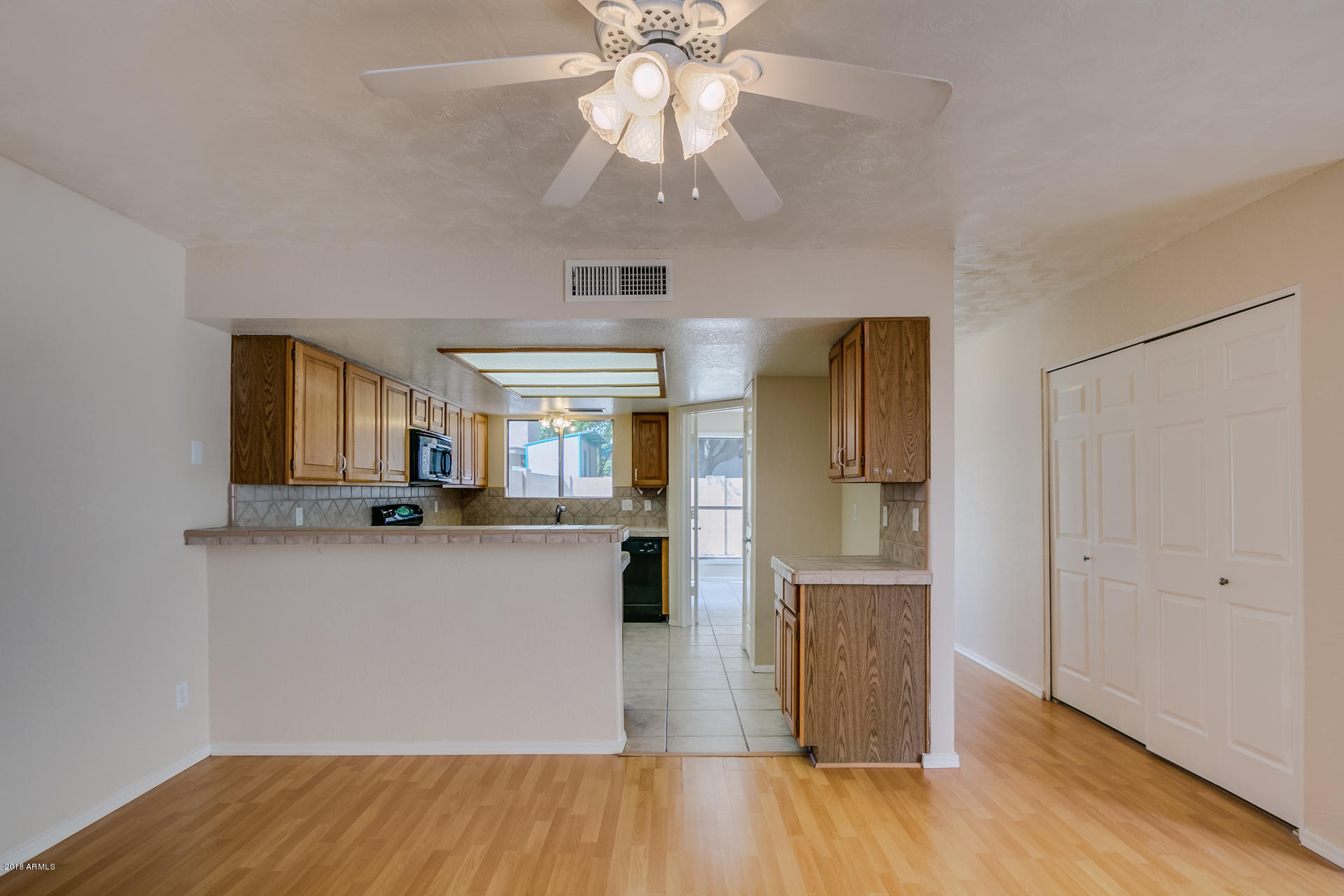 522 East Utopia Road Phoenix, AZ 85024 - Photo 11 of 35 a kitchen with stainless steel appliances granite countertop a refrigerator and a sink