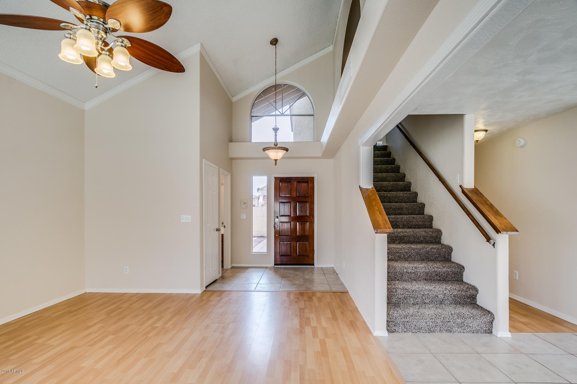 522 East Utopia Road Phoenix, AZ 85024 - Photo 14 of 35 a view of entryway and hall with wooden floor