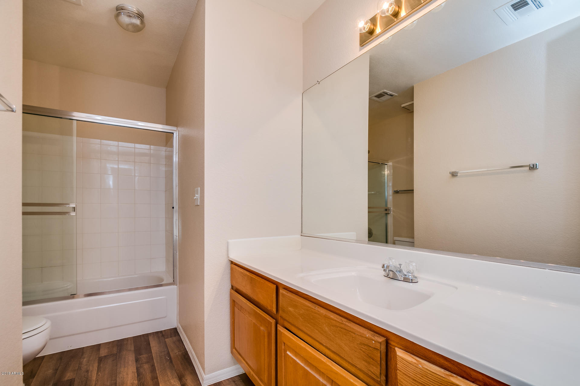 522 East Utopia Road Phoenix, AZ 85024 - Photo 22 of 35 a bathroom with a granite countertop sink and a mirror