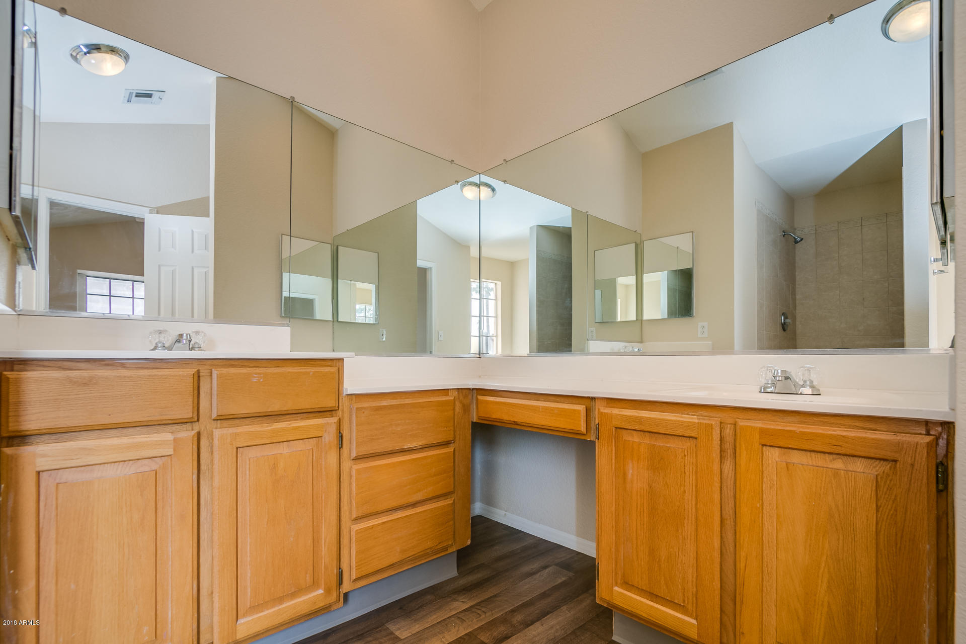 522 East Utopia Road Phoenix, AZ 85024 - Photo 29 of 35 a bathroom with a sink and a mirror