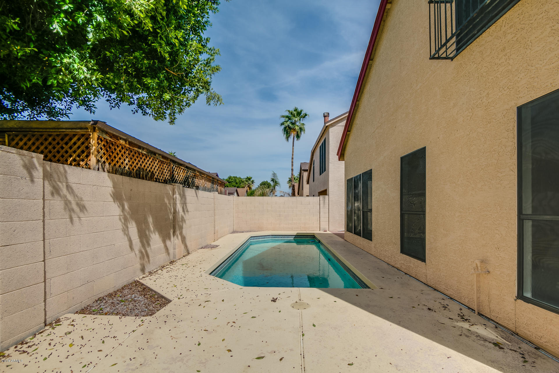 522 East Utopia Road Phoenix, AZ 85024 - Photo 32 of 35 a view of balcony with wooden floor and potted plants