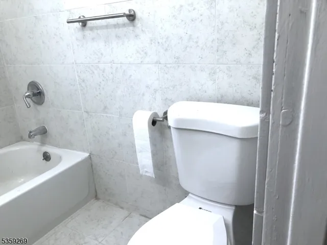 a bathroom with a sink and toilet