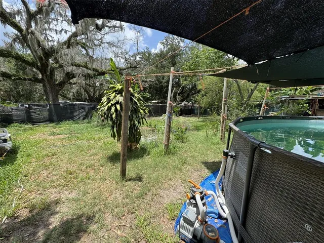 a view of outdoor space and yard