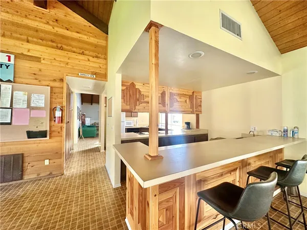 a lobby with furniture and window